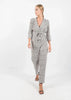White Polka Dot Styled Jumpsuit with Belt and Lapels by Linu