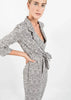 White Polka Dot Styled Jumpsuit with Belt and Lapels by Linu